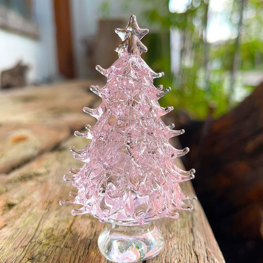 Green crystal Christmas tree ornament hanging on holiday tree
