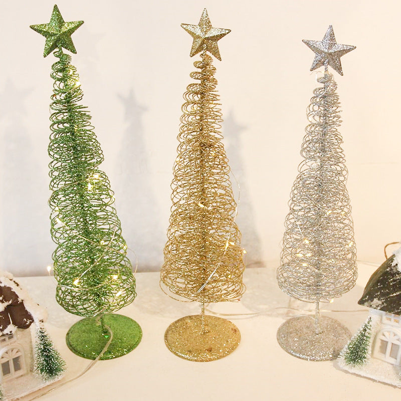 Glowing Christmas ornament featuring festive green and gold colors