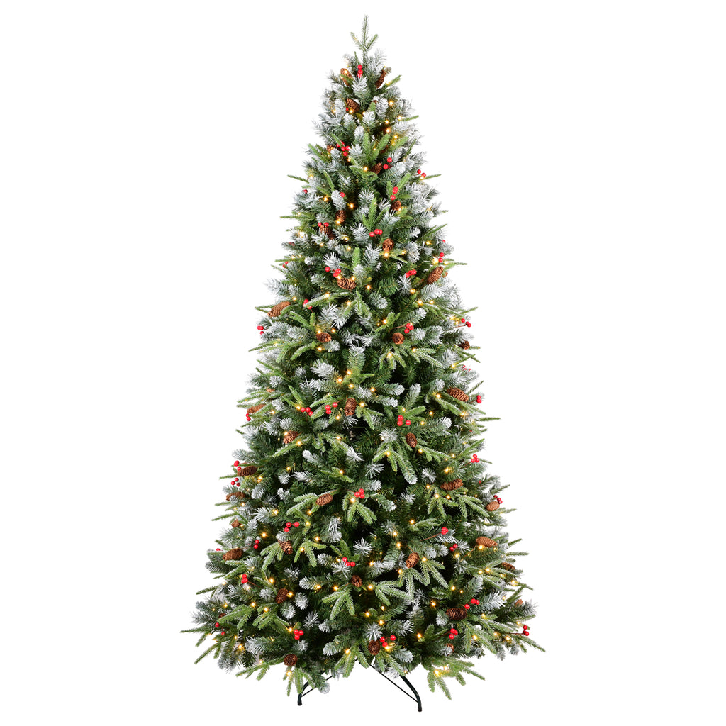 Glowing warm white LED Christmas tree with festive red berry decorations