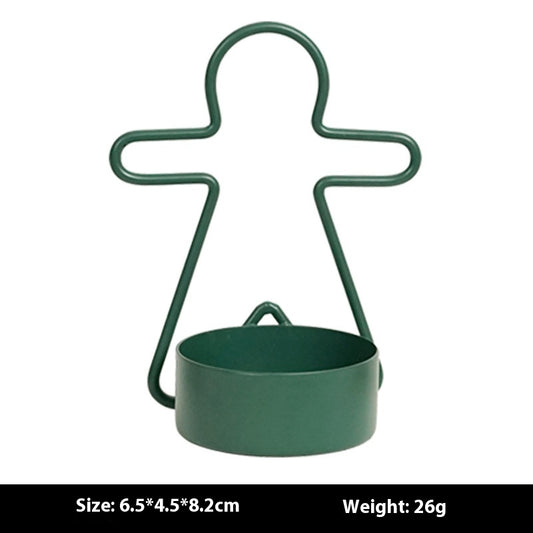 Red gingerbread man candlestick decoration for Christmas home
