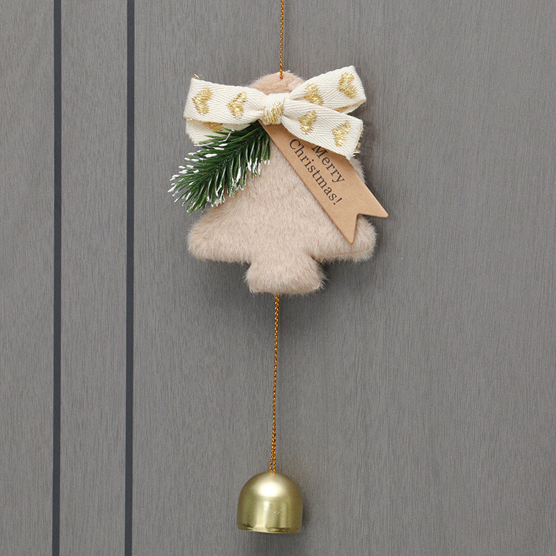 Faith-inspired Christmas bell pendant symbolizing sacred holiday invitation
