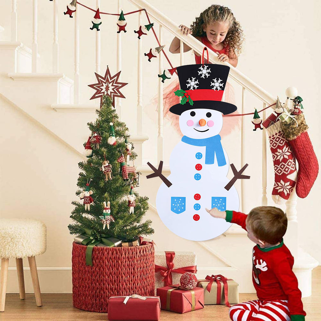 Close-up of felt snowman hat and scarf pieces in red and green