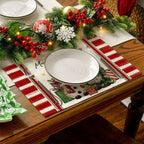 Set of linen placemats displayed in a tasteful Christmas dining arrangement