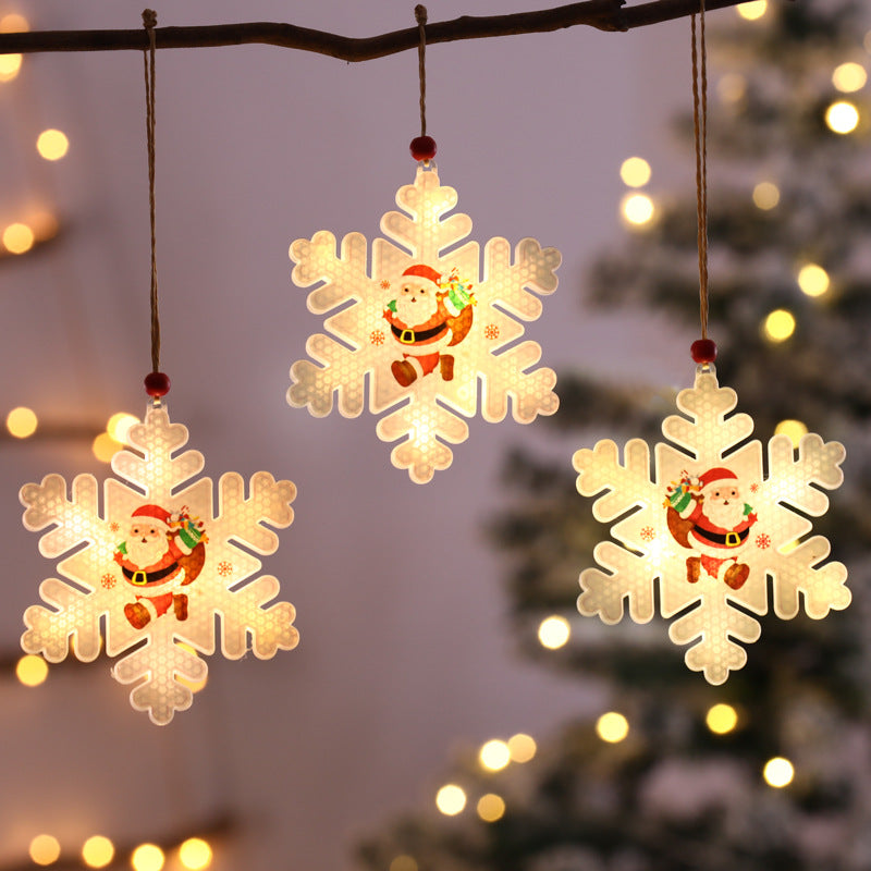 Assorted Christmas snowflake hanging lights in warm glow setting