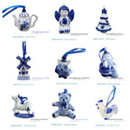 Blue and white porcelain pendant ornament displayed on a decorated tree