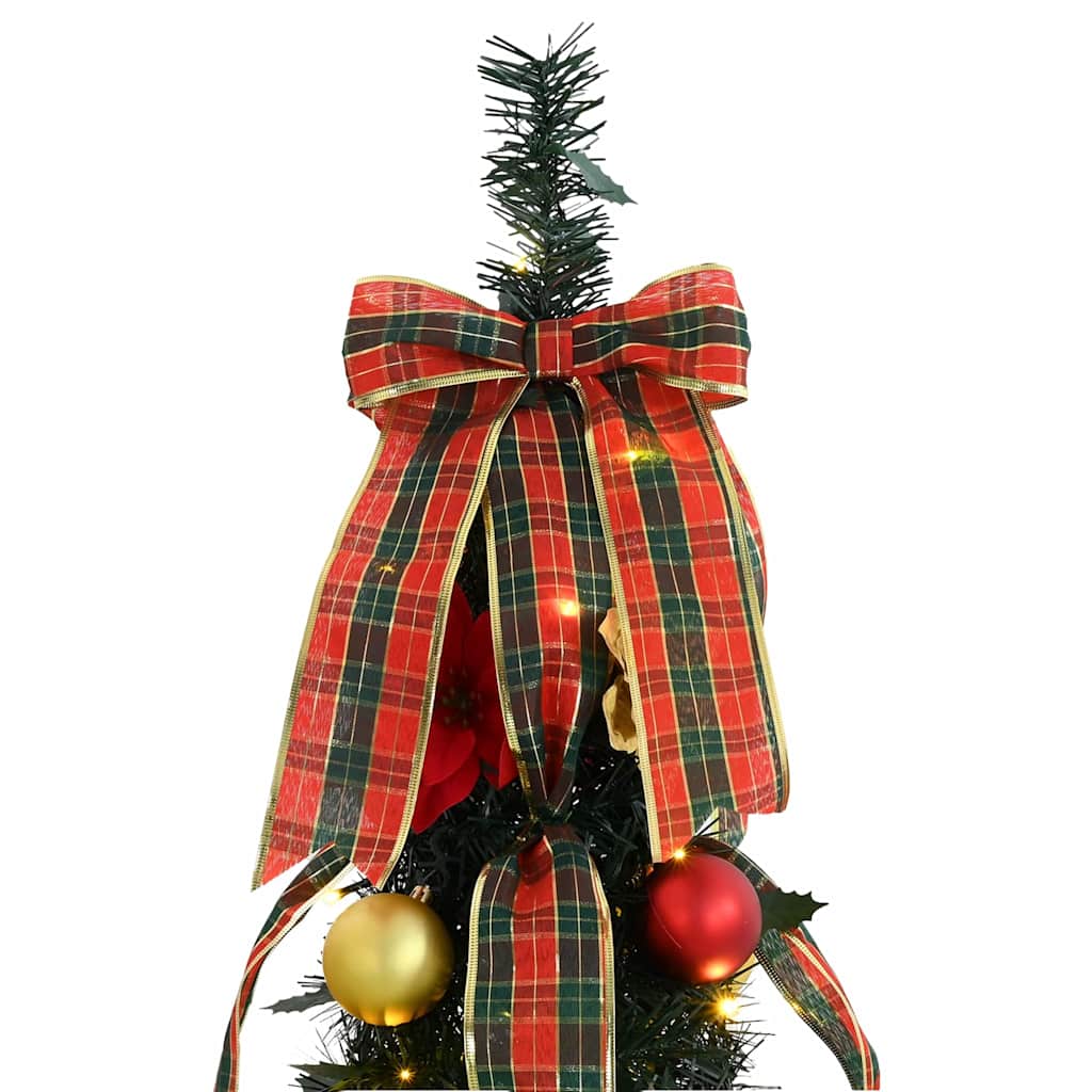 Artificial Christmas tree with LEDs in an indoor living space with soft lighting