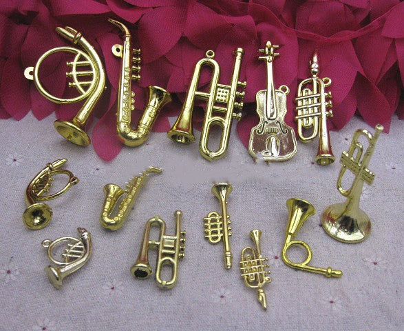 Small Musical Instrument Christmas Ornament Set displayed on a festive tree with faith-inspired holiday ambiance