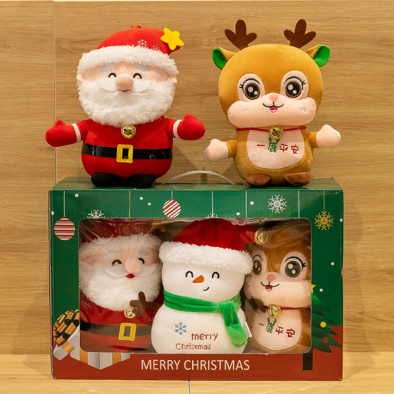 Christmas plush toy doll in seated Santa pose with red outfit
