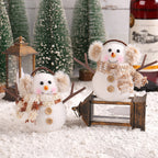 Luminous ice man Christmas ornament with festive scarf styling on display