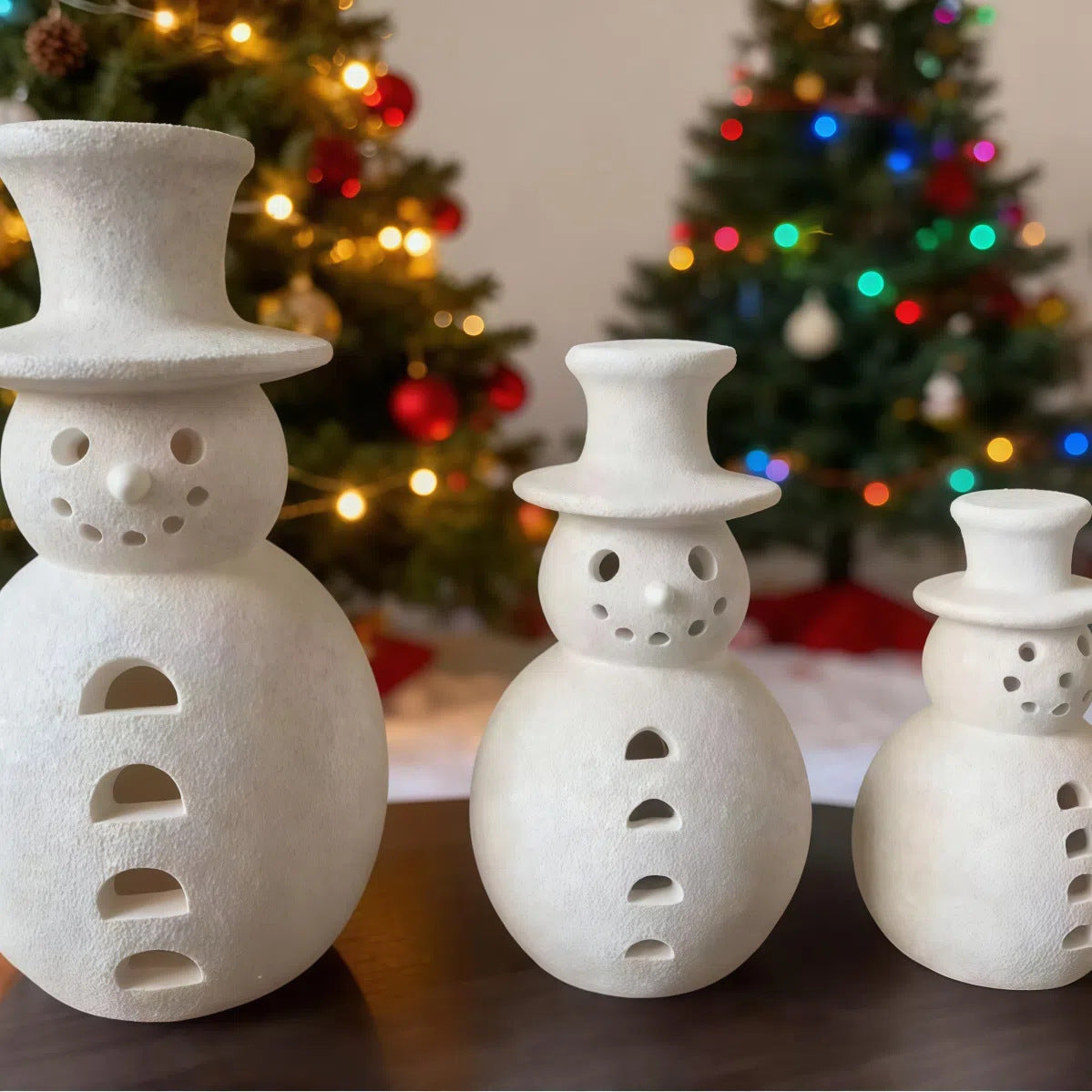 Large retro snowman resin ornament as festive mantle decoration during Christmas season