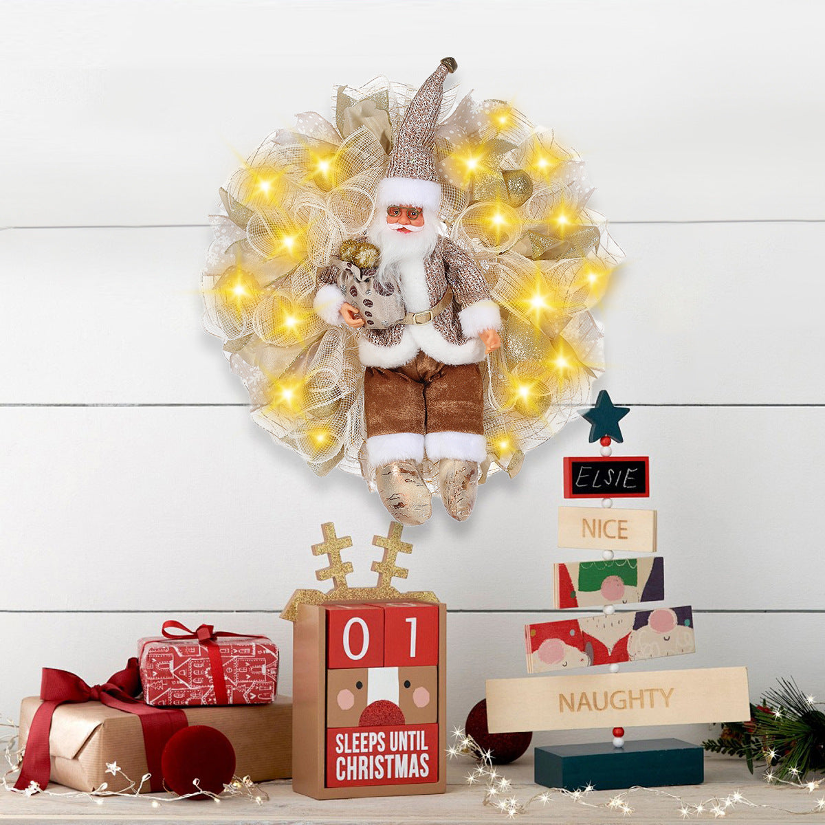 Festive Christmas garland ornament with red berries and golden lights