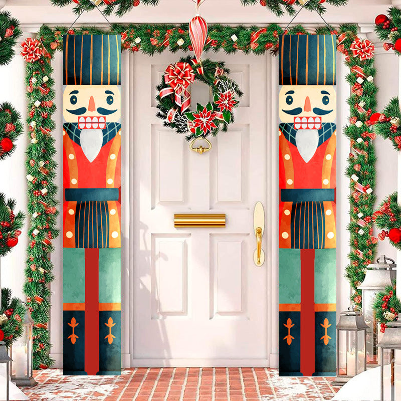 Christmas couplet flag with nutcracker and snowman design displayed decoratively