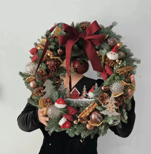 Christmas ornament garland pieces arranged showing packaging in OPP bag