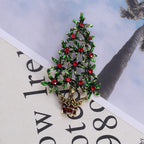 Elegant green brooch with Christmas tree design for holiday outfits