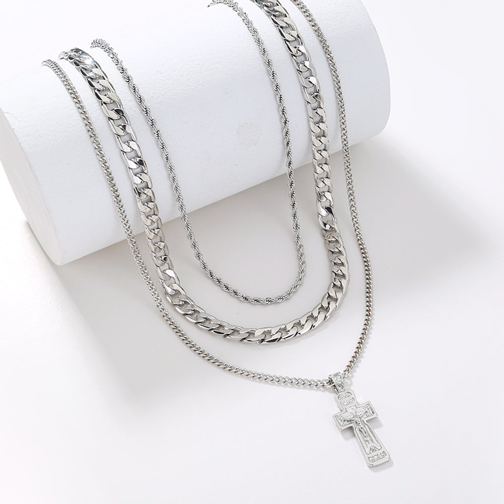 Close-up of layered cross pendant design on adjustable chain