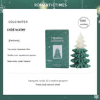 Christmas scented candle in gypsum vessel with soft glowing flame