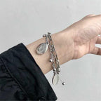 side angle of the double layer Jesus pendant and chain links