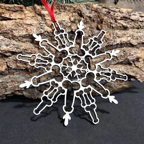 Close-up of snowflake design on pendant ornament