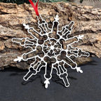 Close-up of snowflake design on pendant ornament