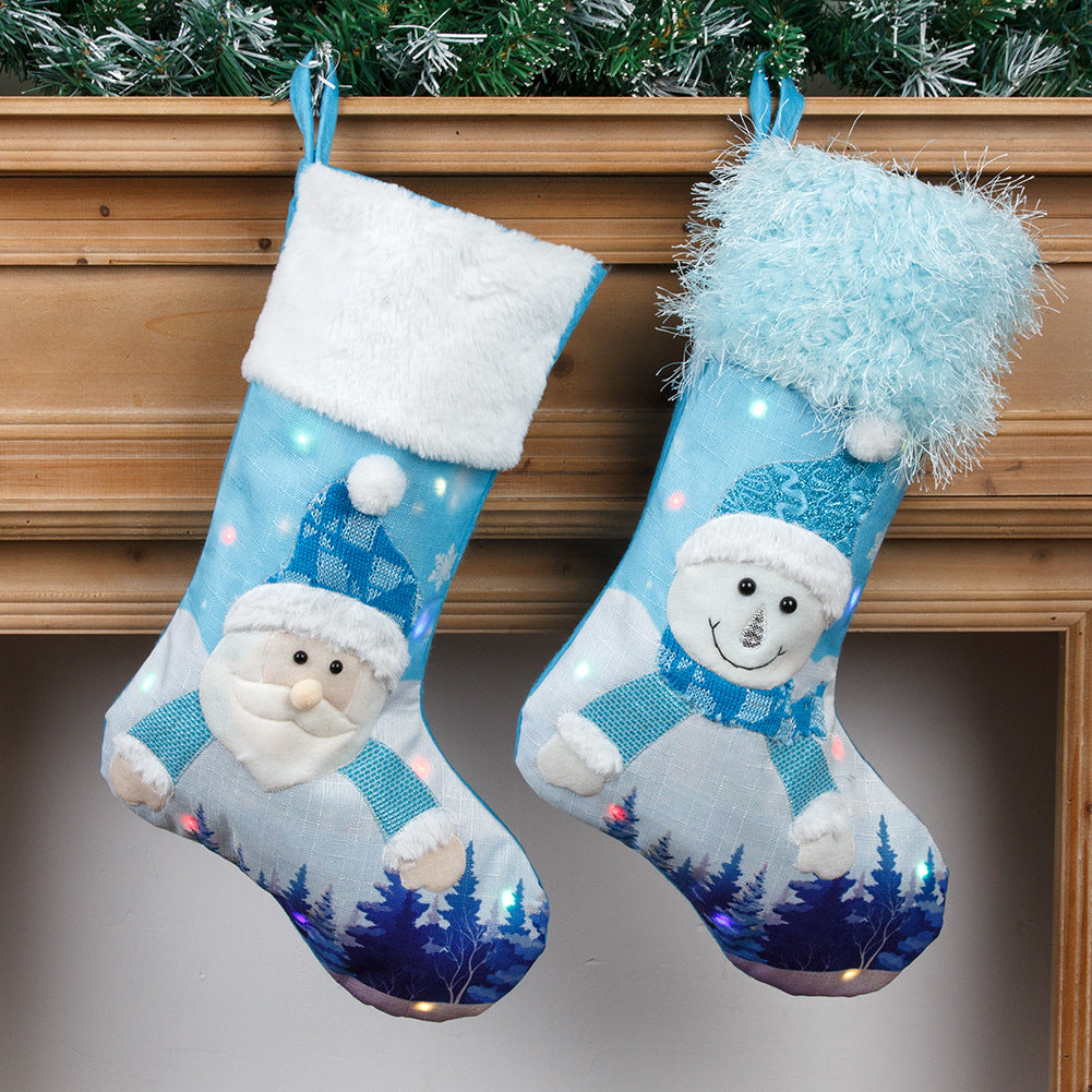 Plush Christmas stocking featuring Santa Claus style with full-width holiday print