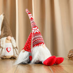 Display view of a faceless cloth doll ornament with distinctive character design