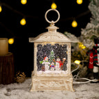 Christmas crystal ball music box with swirling snow and golden hoop decoration
