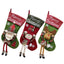 Three colorful Christmas stockings featuring Santa, Snowman, and Reindeer characters with 3D applique design for holiday fait