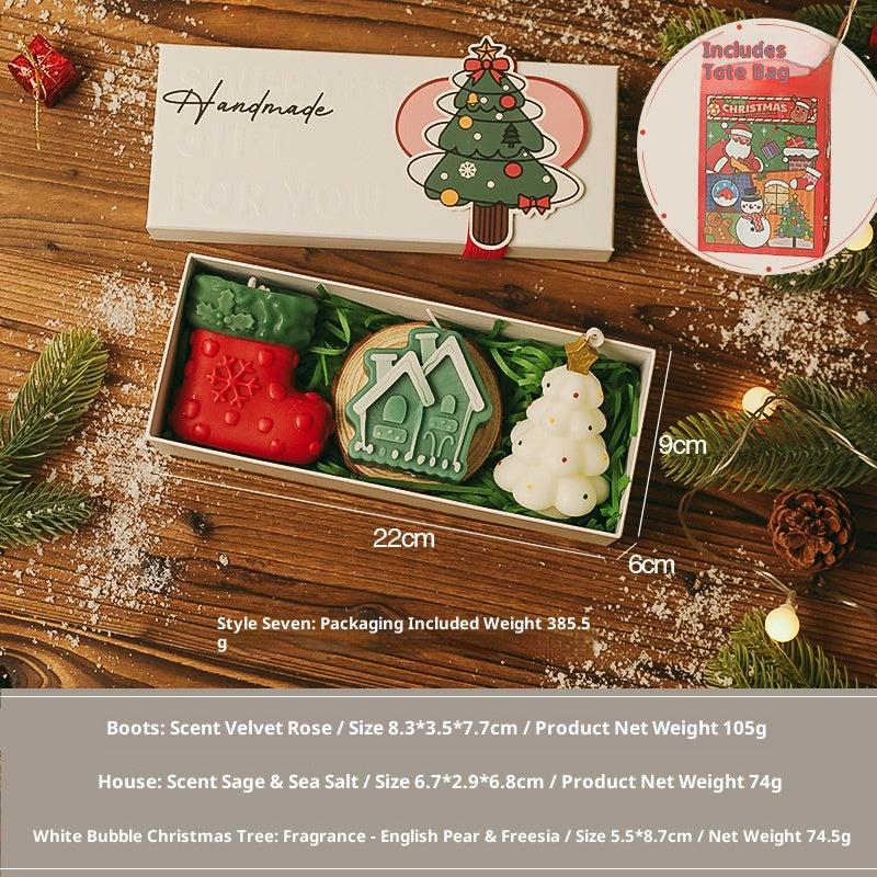 Holiday gift set featuring Christmas themed candle arrangements