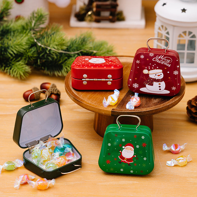 Decorative holiday handbag candy boxes on display