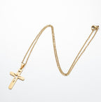 Vintage stainless steel cross pendant necklace in gold finish on a chain