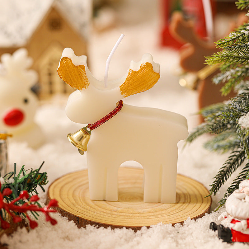 Handmade soy wax Christmas Elk aromatherapy candle in red color with warm glow