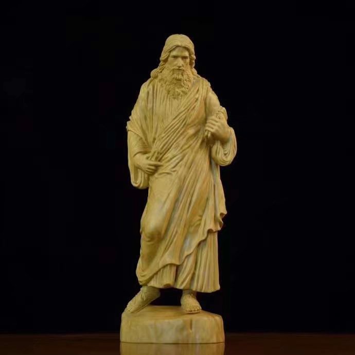 Intricate boxwood carving depicting Jesus Christ in Chinese style Main image