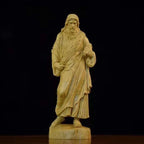 Intricate boxwood carving depicting Jesus Christ in Chinese style
