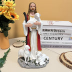 European style nativity scene with shepherd holding lamb near baby Jesus in resin