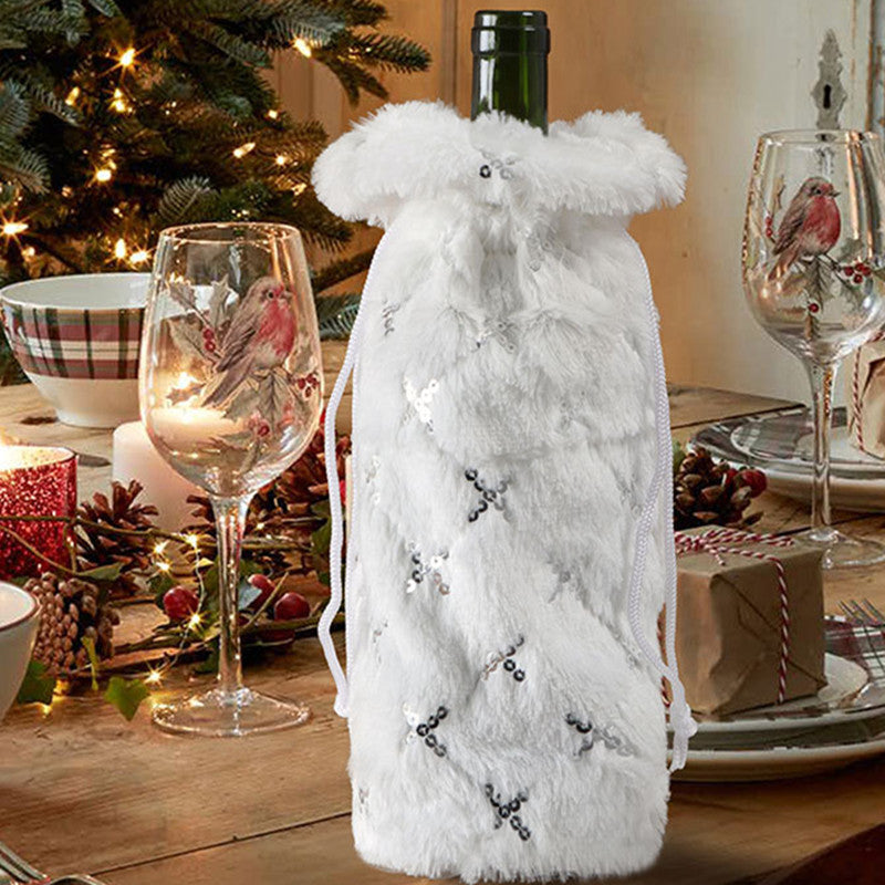 Cozy fleece bottle cover featuring sequin embroidered snowflake design