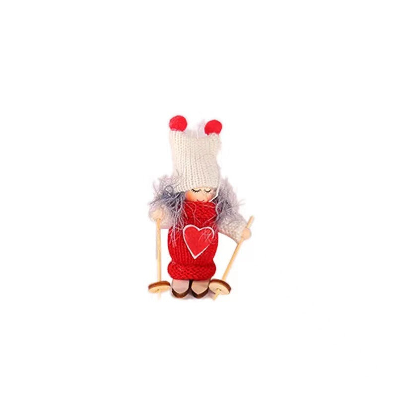Wooden ski doll Christmas ornament showing detail of wool and wood craftsmanship