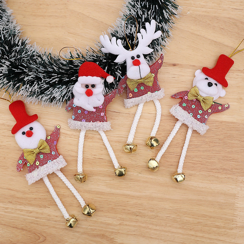 Four Christmas pendant ornaments for festive window display and holiday decorating