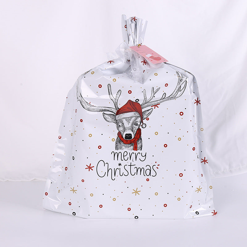 Festive aluminum foil gift bag with holiday motif for Christmas giving