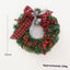 Christmas garland bow in American country style displayed as festive door decoration