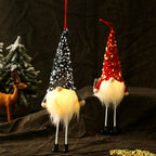 Silver Christmas doll with long legs and soft glow