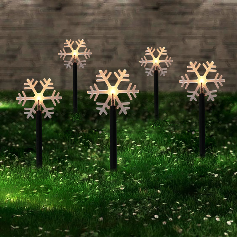 Acrylic snowflake lampshade detail on solar-powered ground light
