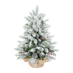 Decorated tabletop Christmas tree with natural-looking pine cones and berries