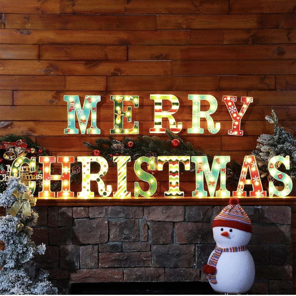 Bright festive Christmas wall decoration with glowing letters