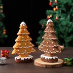 Gingerbread tree Christmas figurine adding holiday warmth to shelf arrangement