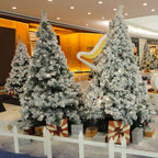 Elegant flocked snow Christmas tree in living room setting
