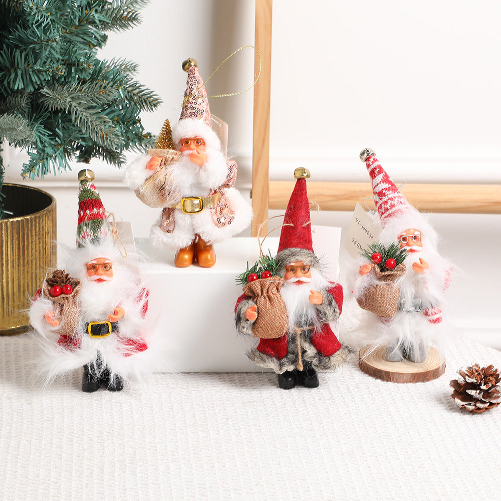 Standing Santa Claus doll in red with white trim on wooden floor