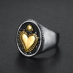 Sacred Heart and cross ring with vintage biker aesthetic