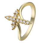 Gold-tone diamond cross ring with sterling silver inlay accent