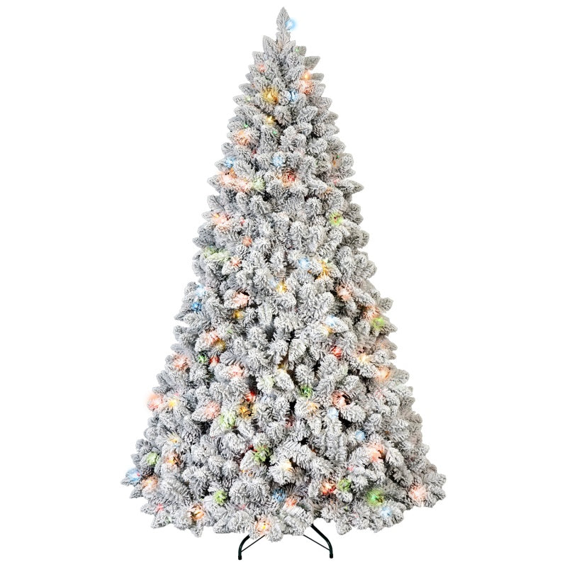 Christmas tree with mixed flocked branches creating a snowy winter aesthetic