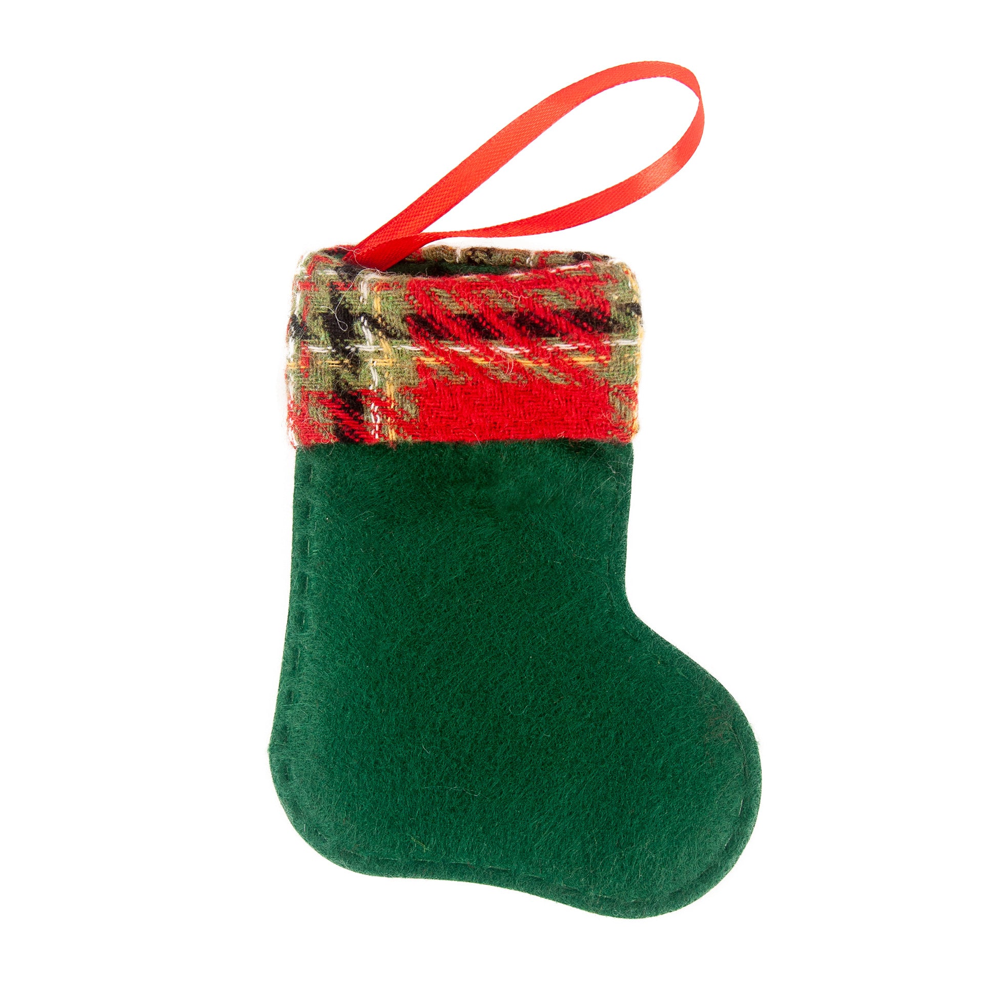Set of four fabric Christmas stocking-shaped pendants in festive colors hanging together